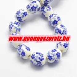 Porcelán ékszergyöngy. 12x10mm. Sötétkék virág.