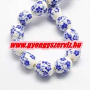 Porcelán ékszergyöngy. 12x10mm. Sötétkék virág.
