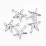 Acél medál. Charm, fityegő. Tengeri csillag. 16.5x13.5x1mm.