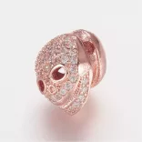 Cirkon kristályos gyöngy.  Koponya. 11.5x9.5x11mm. Rózsaarany szín.
