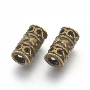10db. Köztes fémgyöngy. Antik bronz szín. 12x6mm.