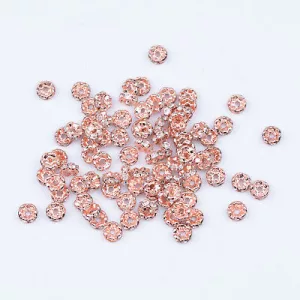 10db. Strasszos fém köztes, rondell. 6x2.5mm. Hullámos rózsaarany.