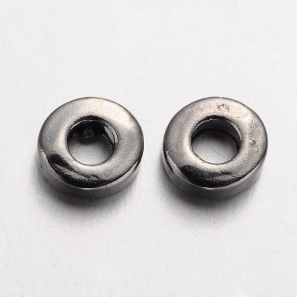 20db. Fém köztes gyöngy. 6x2mm. Fekete szín.