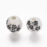 Porcelán ékszergyöngy. 10mm. Fekete virág.