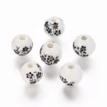 Porcelán ékszergyöngy. 10mm. Fekete virág.