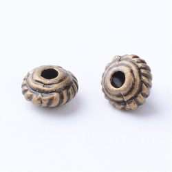 20db. Fém köztes gyöngy. 5x3mm. Antik bronz szín.