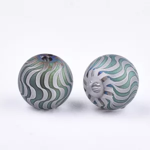 Fémgőzölt . hullámos mintájú üveggyöngy. 8-8.5mm. Zöldeskék. 10db/csomag.
