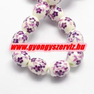 Porcelán ékszergyöngy. 12x10mm. Lila virág.