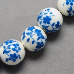 Porcelán ékszergyöngy. 10mm. Királykék virág.
