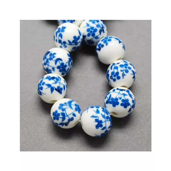 Porcelán ékszergyöngy. 10mm. Királykék virág.