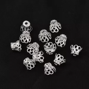 100db gyöngykupak. 5x6mm. Ezüst szín.