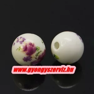 Porcelán ékszergyöngy. 12mm. Lilás virág.