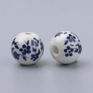 Porcelán ékszergyöngy. 10mm. Poroszkék virág.