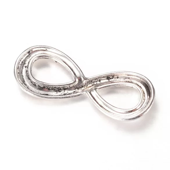 Köztes fém összekötő elem. Végtelen jel. 35x13mm. Antik ezüst szín.