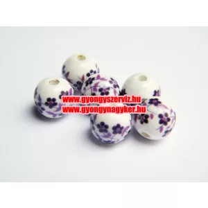 Porcelán gyöngy 10mm. Apró lila virág.
