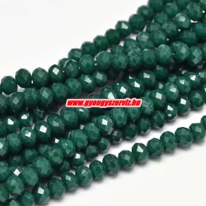 Kiárusítás!  Csiszolt üveggyöngy, fánkgyöngy. 3x4mm. Sötét smaragd. 5g/cs. Mindig akcióban!