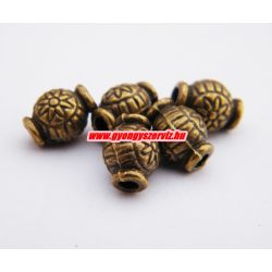   10db. Fémgyöngy, fém köztes gyöngy. 9x7mm. Virágos.  Antik bronz szín.