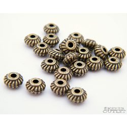   20db. Korong. 6x3.5mm. Antik bronz szín. Fémgyöngy, köztes gyöngy.