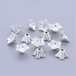 20db gyöngykupak. 8.5x5mm. Ezüst szín.