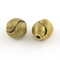   10db. Golyó. 9.5x9.5x8mm. Yin-yang. Antik arany szín. Fémgyöngy, köztes gyöngy.