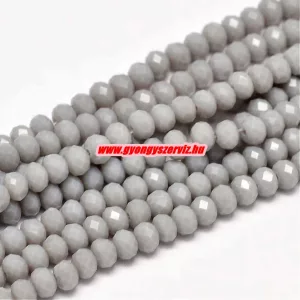 Kiárusítás!  Csiszolt üveggyöngy, fánkgyöngy. 3x4mm. Szürke. 5g/cs. Mindig akcióban!