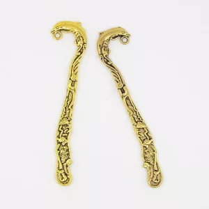 Könyvjelző alap.  83x20mm. Delfines. Antik arany szín.