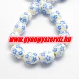 Porcelán ékszergyöngy. 12x10mm. Királykék virág.