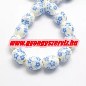 Porcelán ékszergyöngy. 12x10mm. Királykék virág.