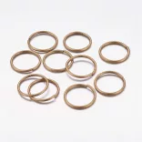 100db. Nyitott szerelőkarika. 14mm. Antik bronz szín.