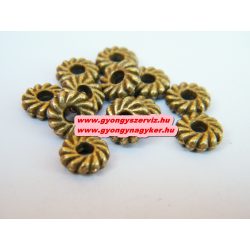   20db. Korong. 8x2.5mm. Antik bronz színű. Fémgyöngy, köztes gyöngy.