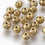 20db. Fém köztes gyöngy. 5.5x4.5mm. Antik arany szín.