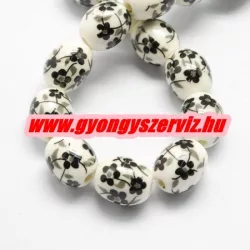 Porcelán ékszergyöngy. 12x10mm. Fekete virág. 