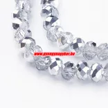 Kiárusítás!  50db. Csiszolt üveggyöngy. 6x4mm. Két szín, ezüst. Mindig akcióban!