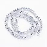 Kiárusítás!  50db. Csiszolt üveggyöngy. 6x4mm. Két szín, ezüst. Mindig akcióban!