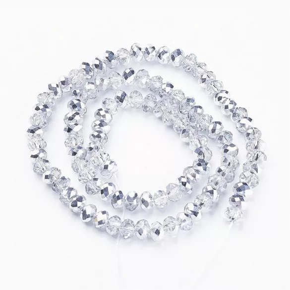 Kiárusítás!  50db. Csiszolt üveggyöngy. 6x4mm. Két szín, ezüst. Mindig akcióban!