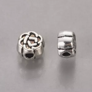 20db. Fém köztes gyöngy. 5.5x3mm. Virág. Antik ezüst szín. 