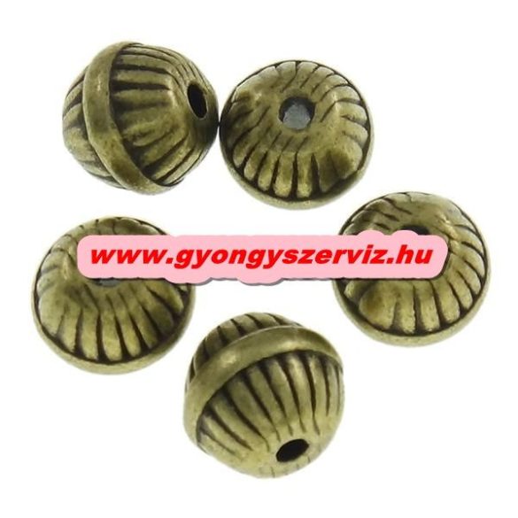 10db. Hordó. 7x6mm. Anik bronz színben. Fémgyöngy, köztes gyöngy.