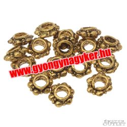   50db. Korong. 6x3x6mm. Antik arany szín.  Fémgyöngy, köztes gyöngy.
