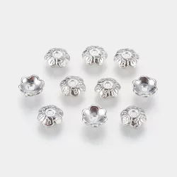 20db. gyöngykupak. 6x2mm. Platina szín.