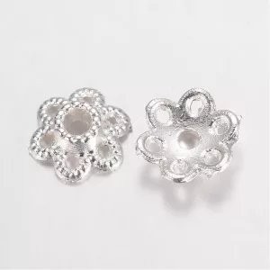 20db gyöngykupak. 6.5x2mm. Ezüst szín.