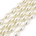 Üveg tekla gyöngy. Rizs forma. 16x8mm. Világos krém. 