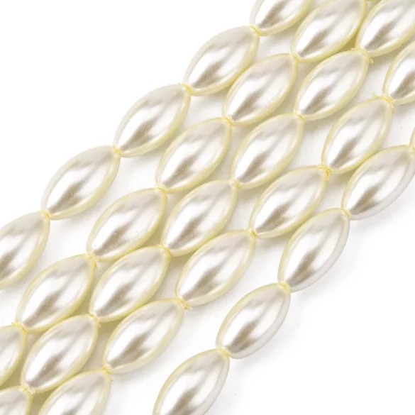 Üveg tekla gyöngy. Rizs forma. 16x8mm. Világos krém. 