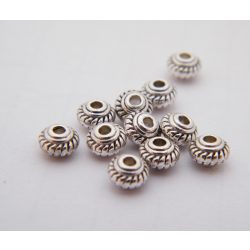 50db. Fém köztes gyöngy. 5x3mm. Antik ezüst szín. 