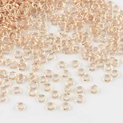 100db. Nyitott szerelőkarika. 5x0.8mm. Rózsaarany szín.