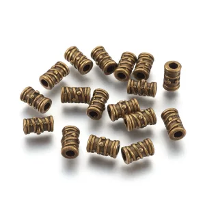 10db. Köztes fémgyöngy. 9x5.5mm. Antik bronz szín.