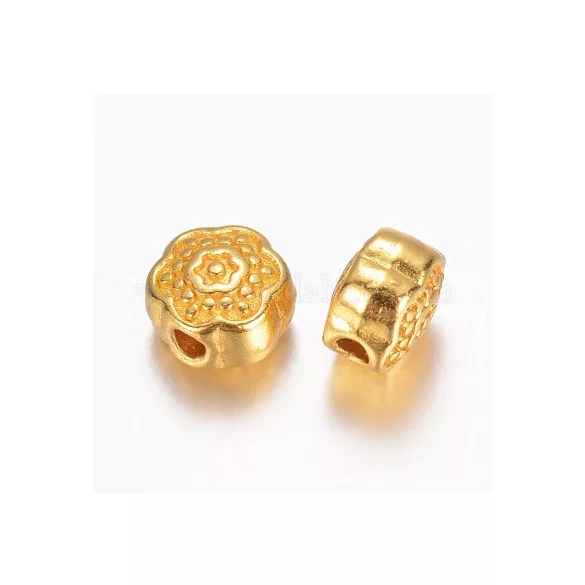 Virág köztes gyöngy. 5.5x4mm. 5 színben kérhető.