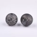 Fémgőzölt . repesztett mintájú üveggyöngy. 8-8.5mm. Sötétszürke. 10db/csomag.